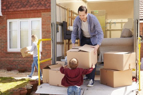 Man and Van service transporting items in Camden