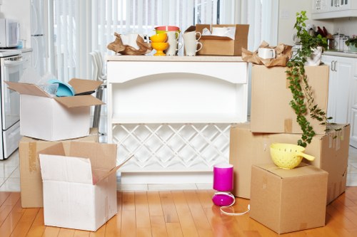 Professional movers efficiently packing a home
